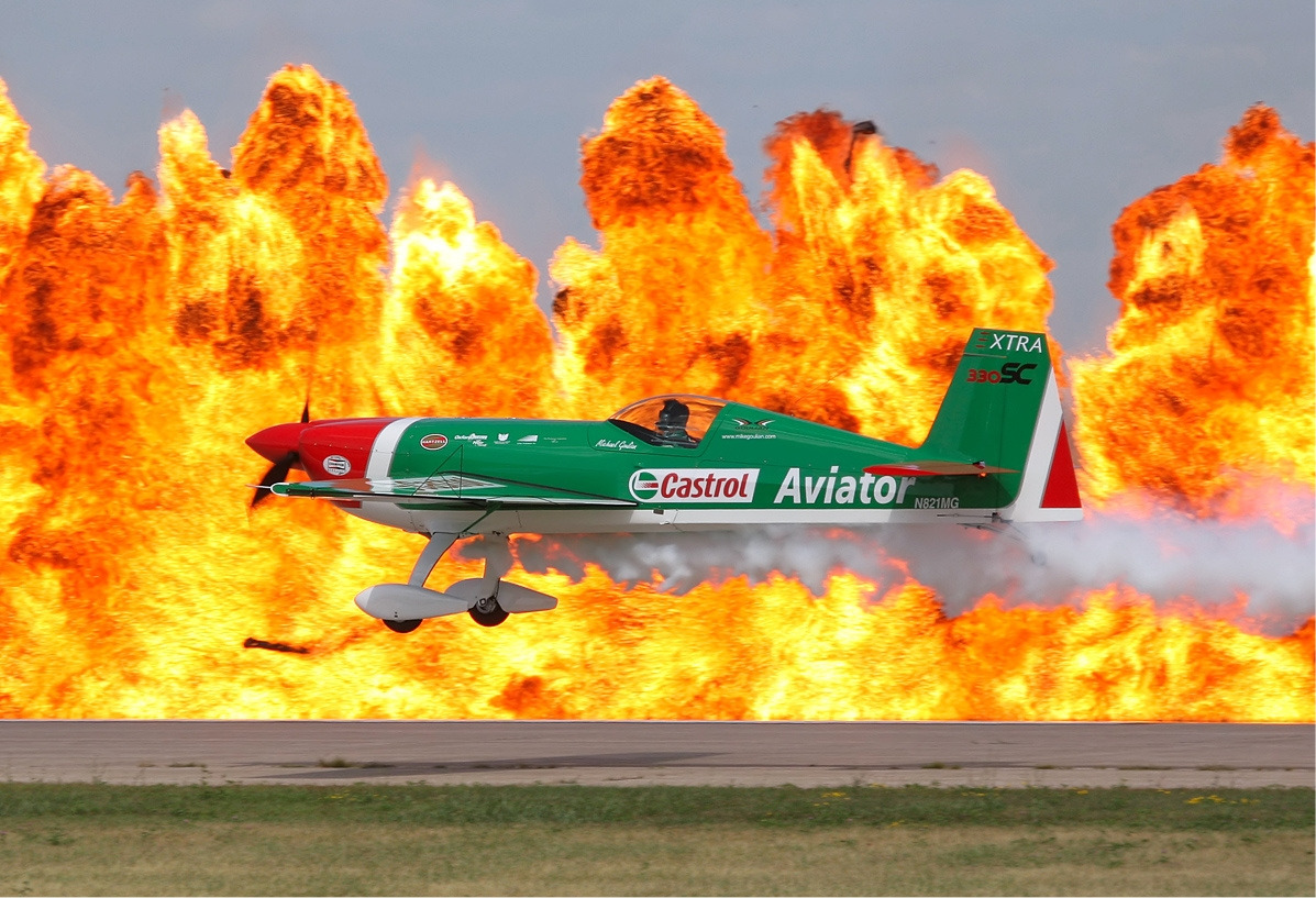 Extra 300 aerobatic monoplane performing at an air show